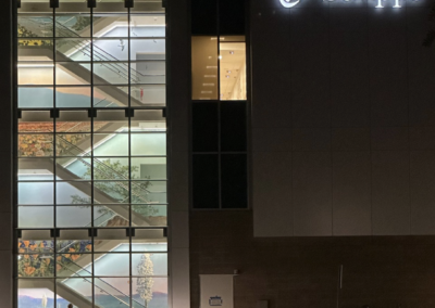Illuminated building with artistic staircase